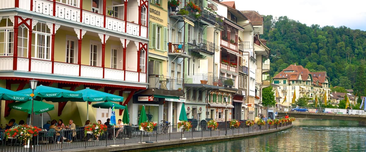 Thun featuring outdoor eating, street scenes and a lake or waterhole