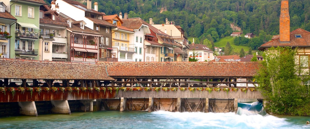 Thun mostrando un puente y un río o arroyo