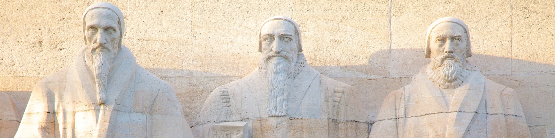Reformation Wall Monument which includes a statue or sculpture and outdoor art