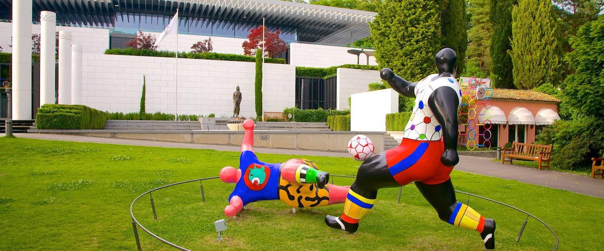 Olympic Museum showing outdoor art and a statue or sculpture