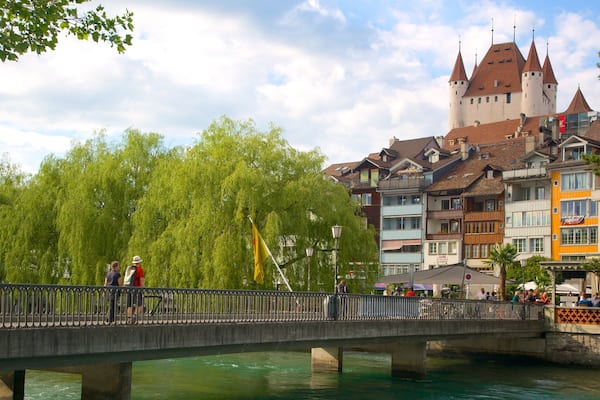Thun Castle featuring a river or creek, a bridge and château or palace