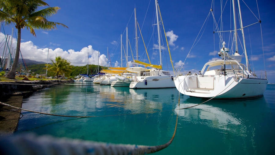 Tahiti which includes tropical scenes, a bay or harbour and sailing