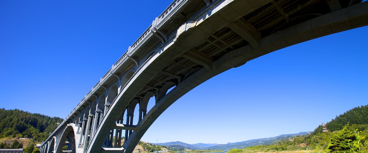 Patterson Bridge featuring a bridge and a river or creek