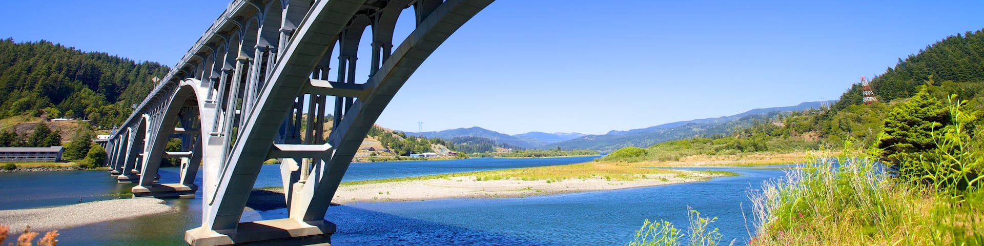 Patterson Bridge featuring a bridge and a river or creek