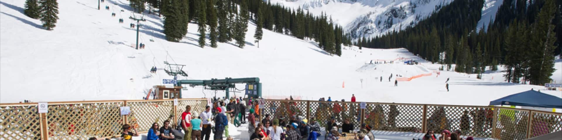 Whitewater Ski Resort featuring snow as well as a large group of people