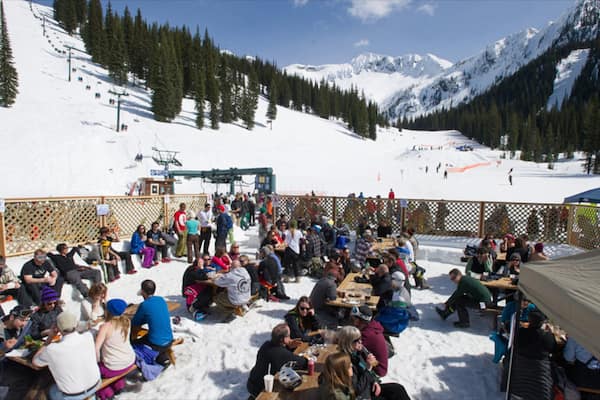 Whitewater Ski Resort featuring snow as well as a large group of people