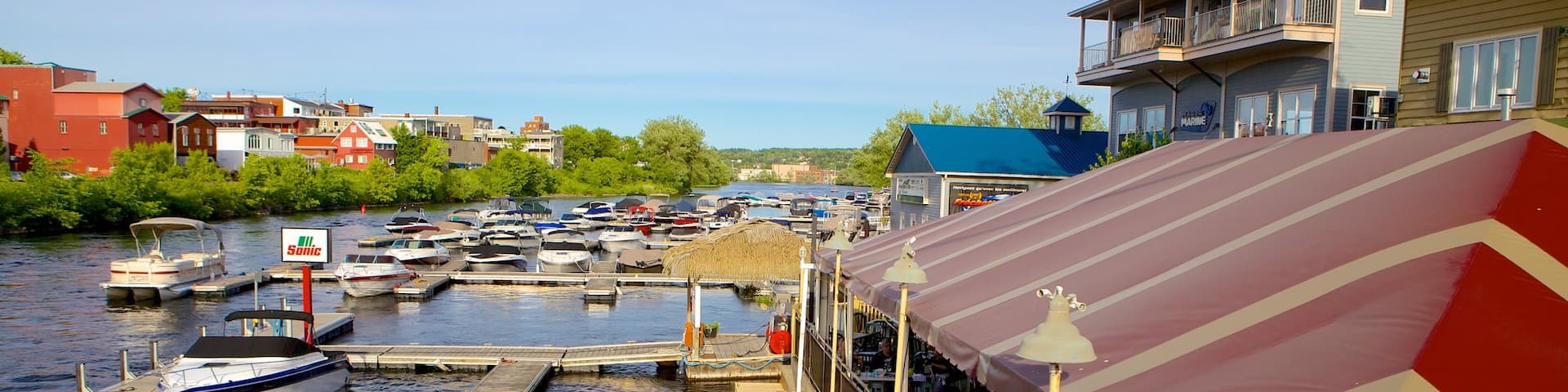 Magog which includes a marina