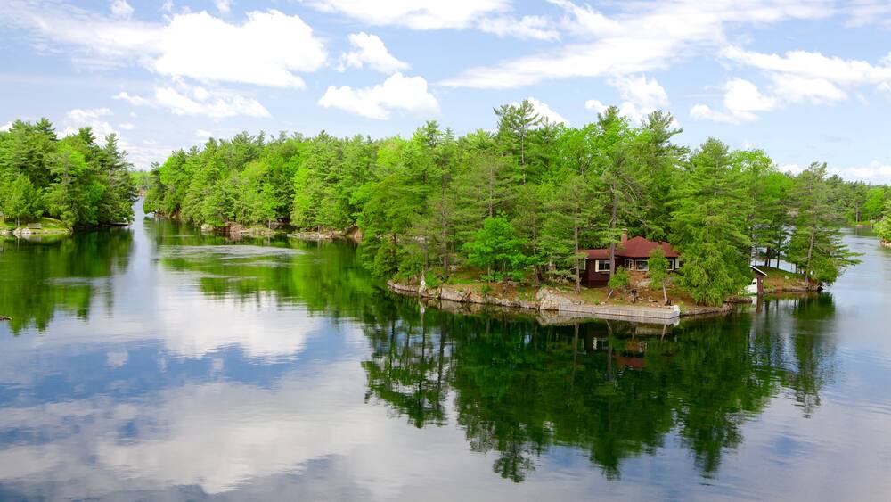 St. Lawrence Islands National Park showing a river or creek and forests