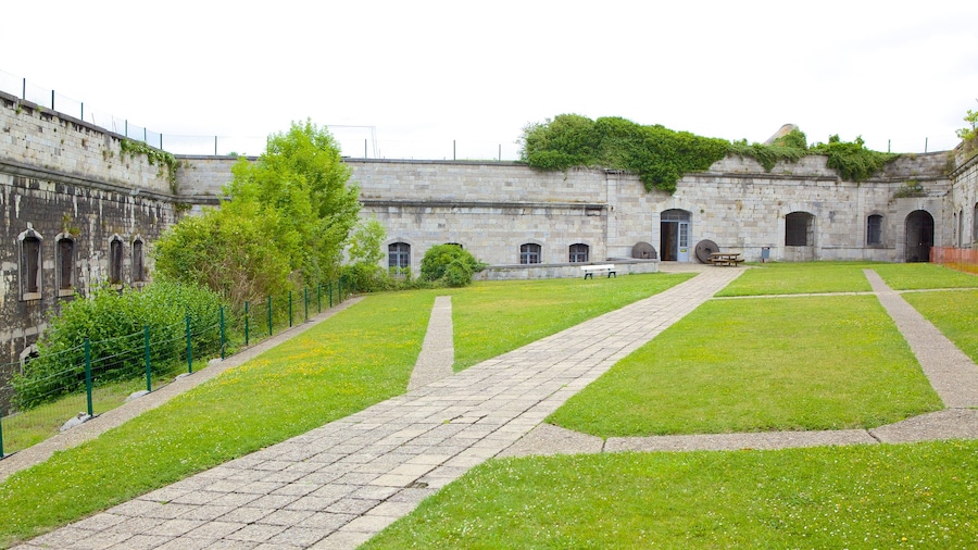Citadel of Huy showing a garden, a castle and heritage architecture