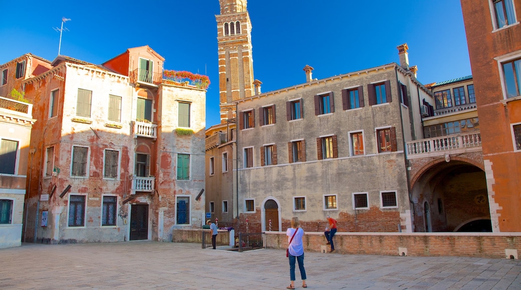 San Marco which includes a square or plaza, heritage architecture and a small town or village