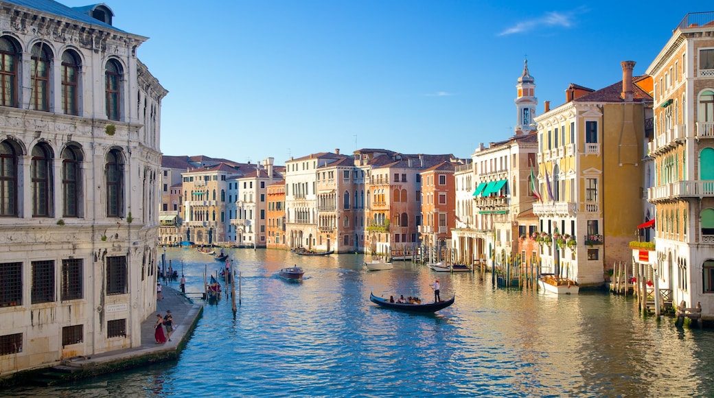 Venice which includes heritage architecture and a river or creek