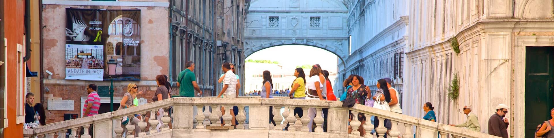 Bridge of Sighs featuring heritage architecture and a bridge as well as a large group of people