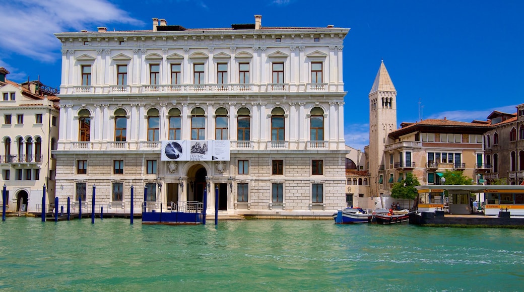 Palazzo Grassi showing a river or creek and heritage architecture