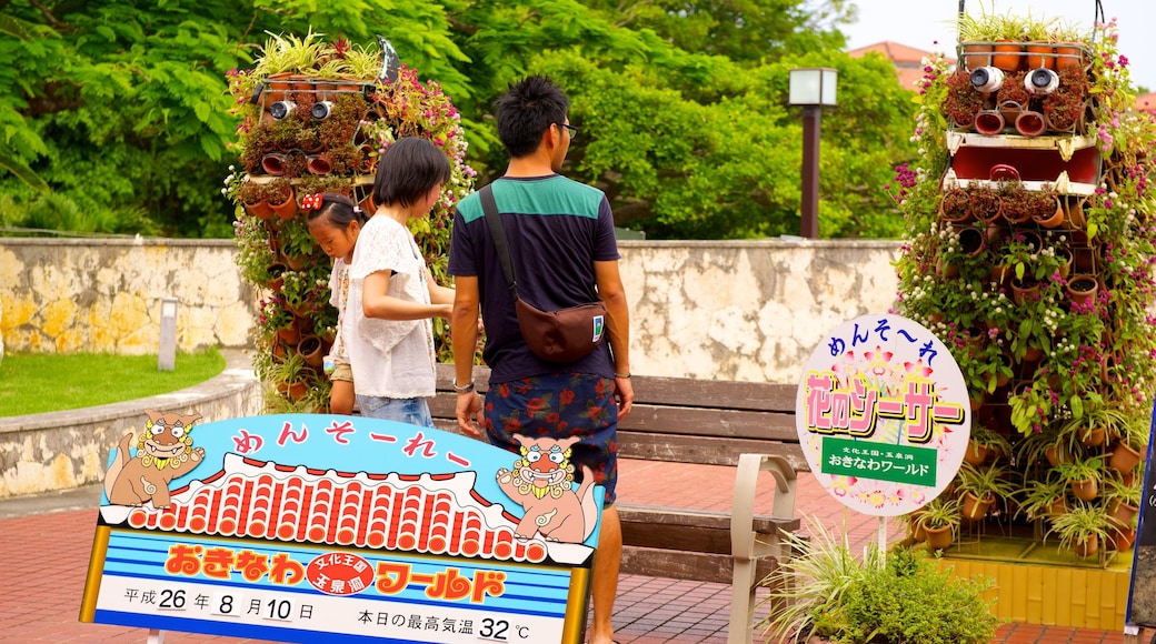 Okinawa which includes outdoor art, signage and a park