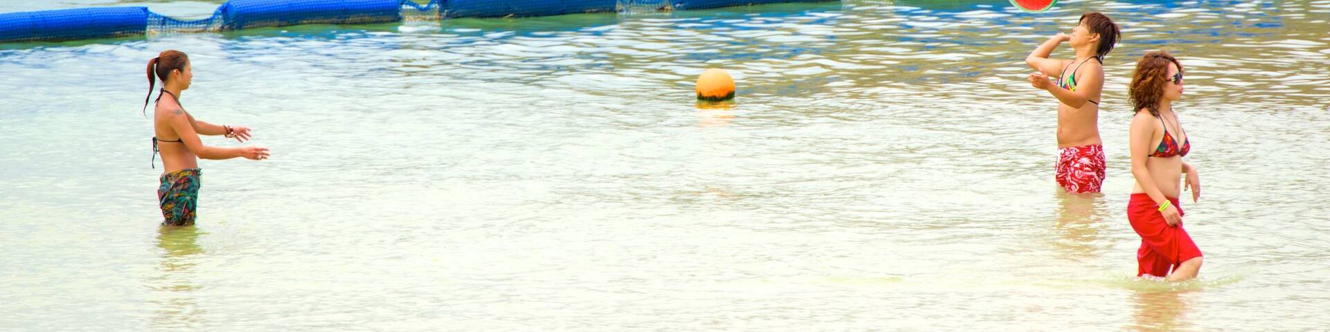 Araha Beach as well as a small group of people