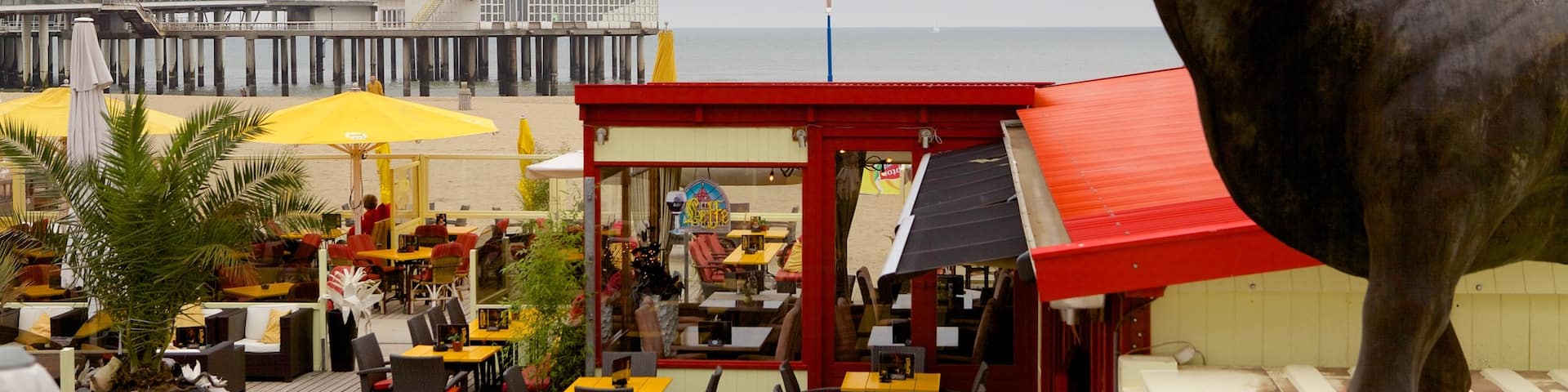 Scheveningen Pier which includes outdoor art and a statue or sculpture