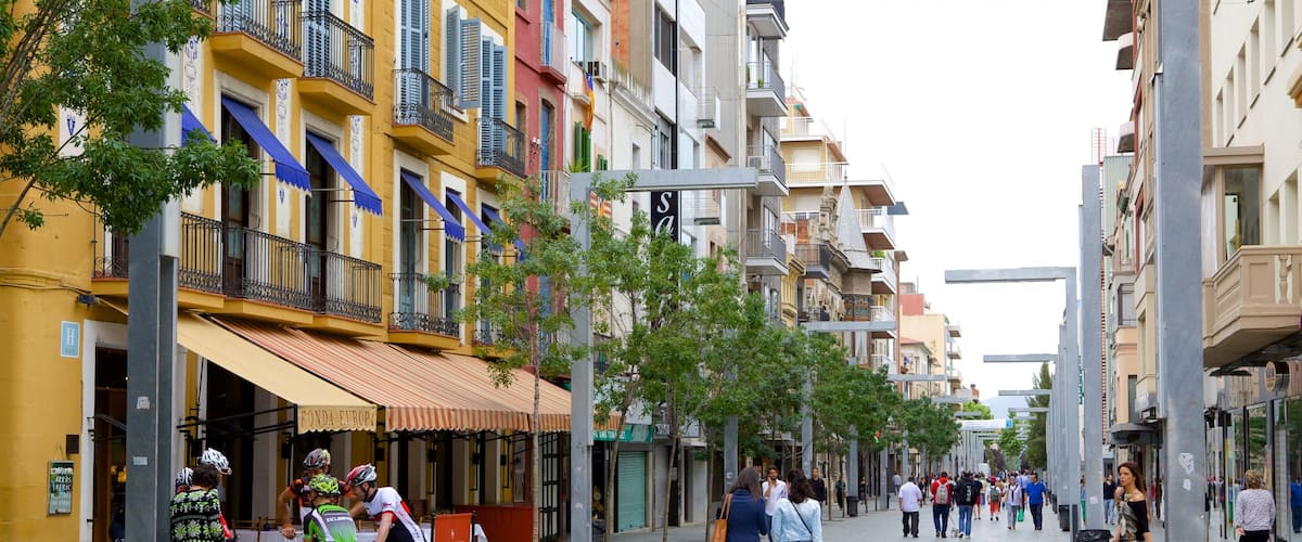 Granollers which includes street scenes as well as a large group of people