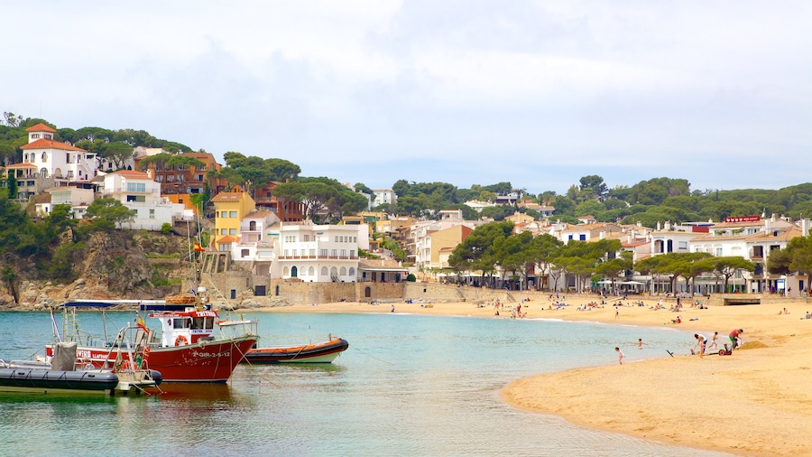 Llafranc which includes a beach and a coastal town