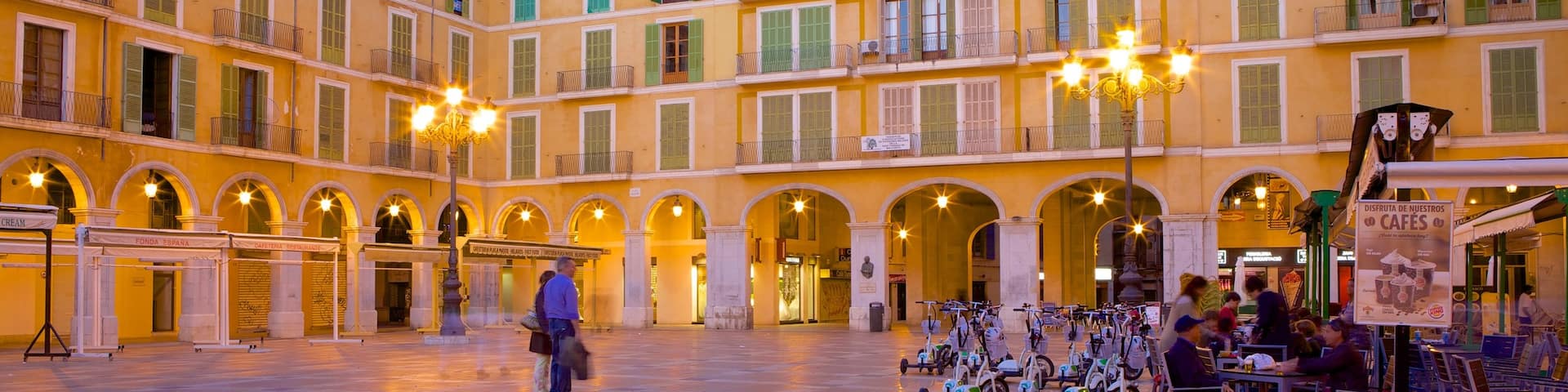 Plaza Mayor de Palma featuring cafe lifestyle, heritage architecture and a square or plaza