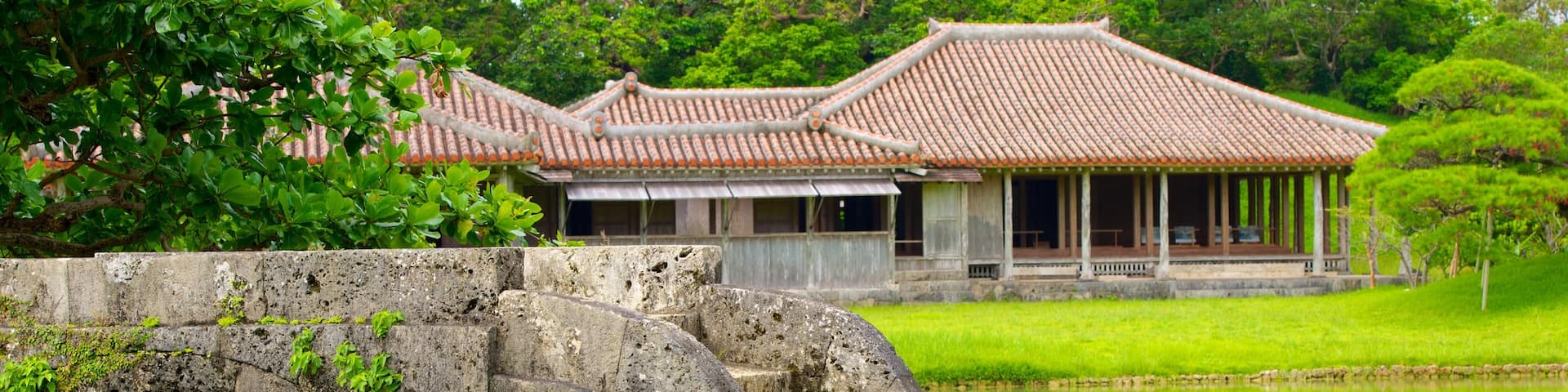 Shikinaen Garden which includes heritage architecture, a pond and a bridge