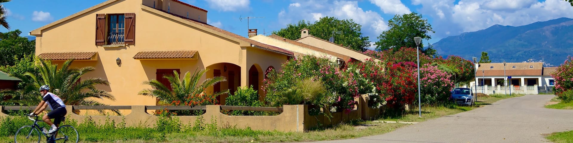 Northern Corsica featuring a house and a small town or village