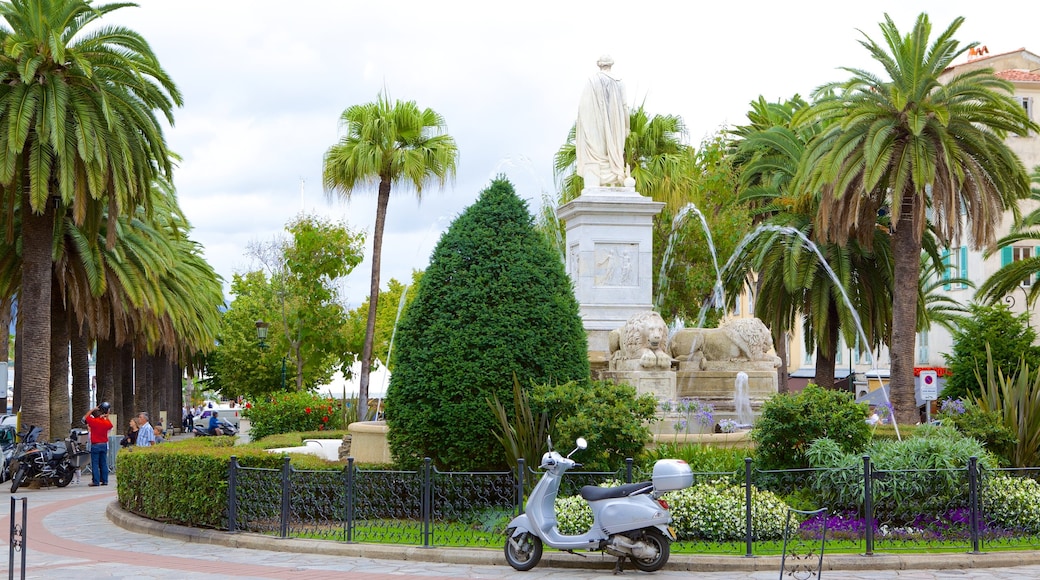 Place Foch mit einem Springbrunnen, Statue oder Skulptur und Garten