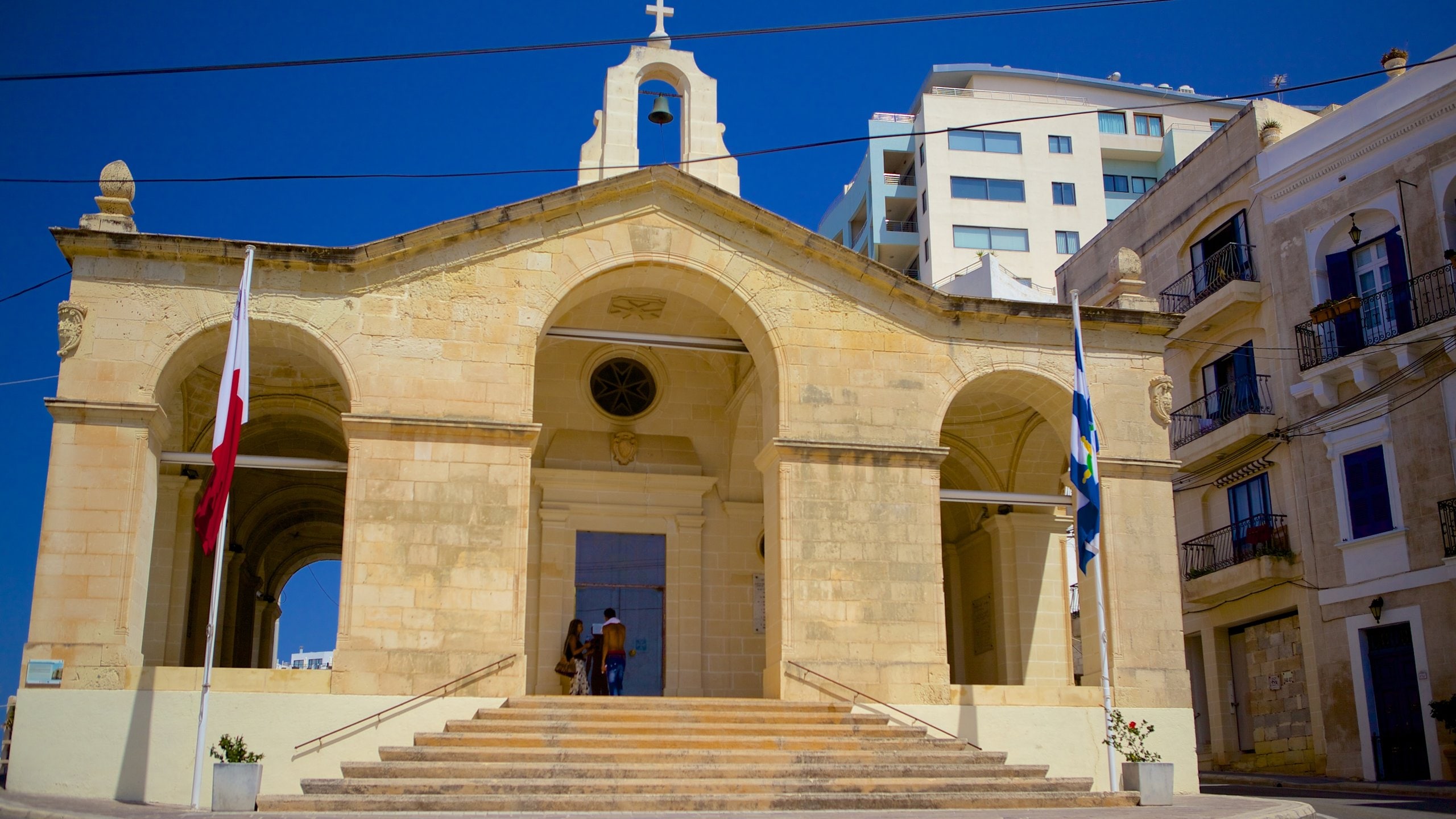 St. Paul\'s Bay which includes heritage architecture, religious elements and a church or cathedral