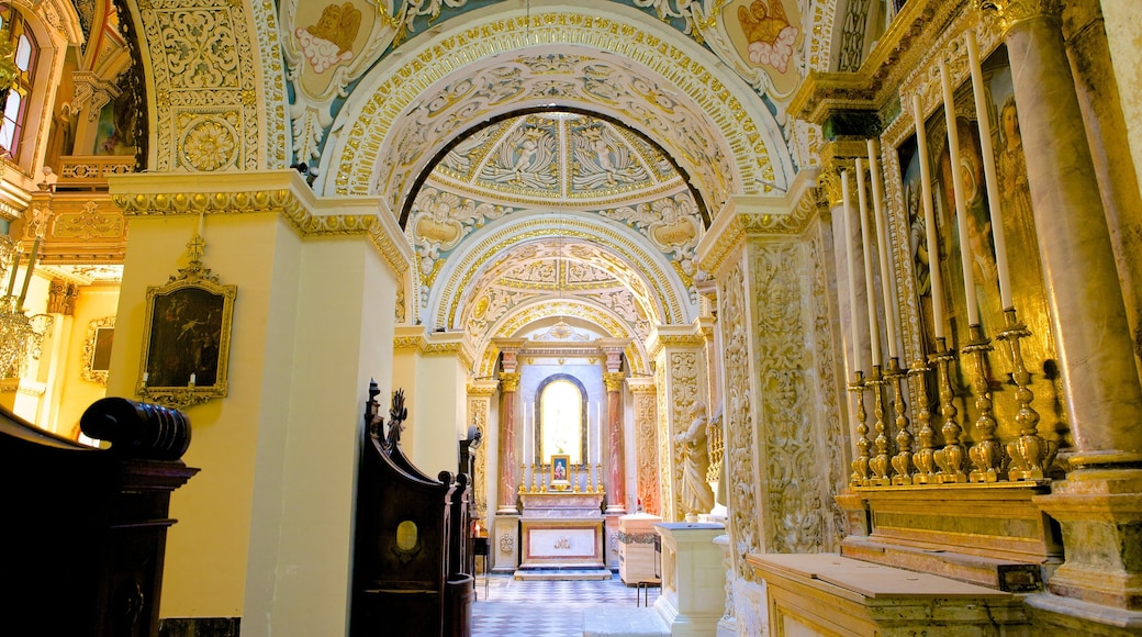 Malta showing a church or cathedral, interior views and heritage architecture