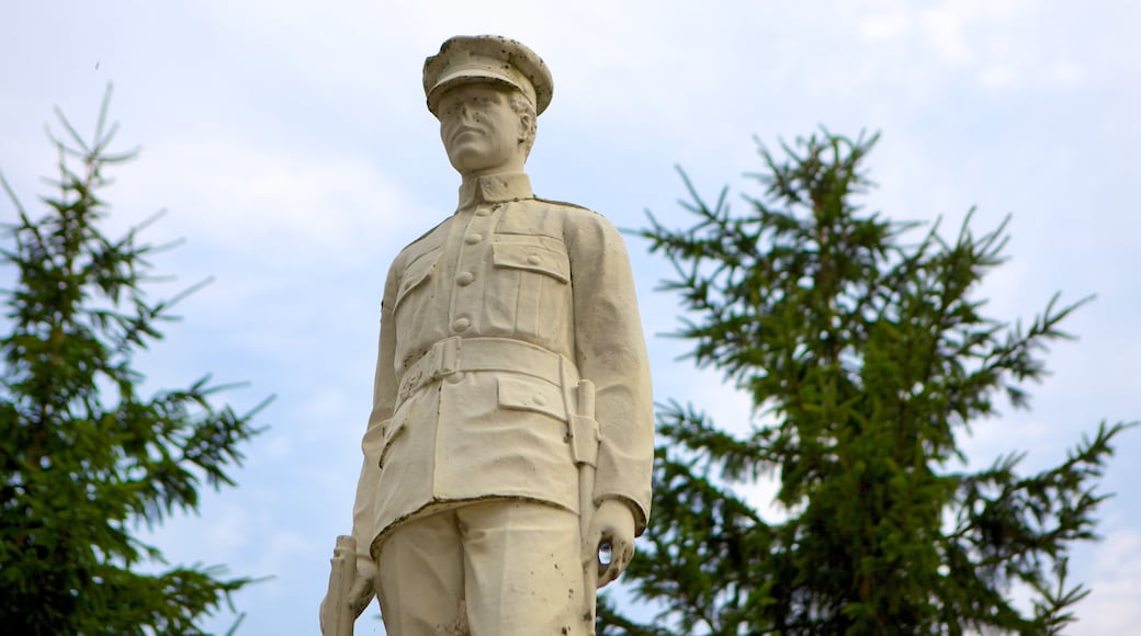 Sydney ofreciendo una estatua o escultura