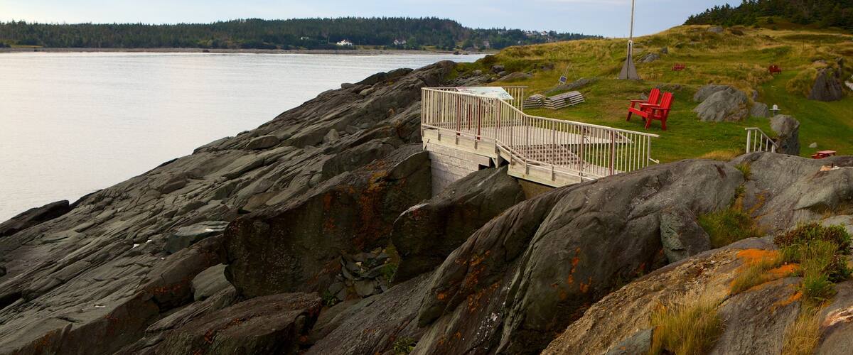 Cape Forchu Lightstation featuring rocky coastline and views