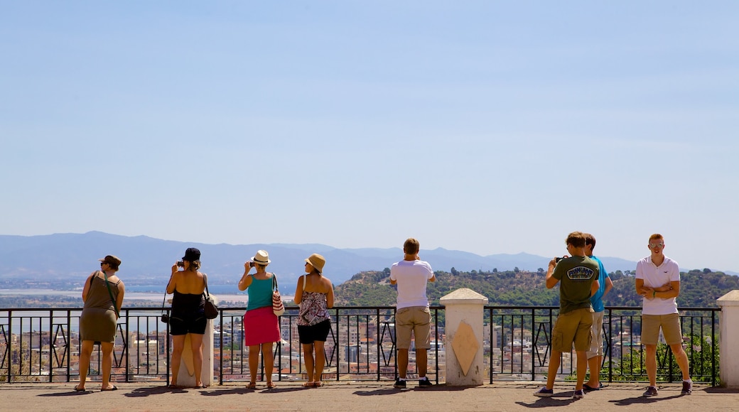 Cagliari showing views as well as a large group of people