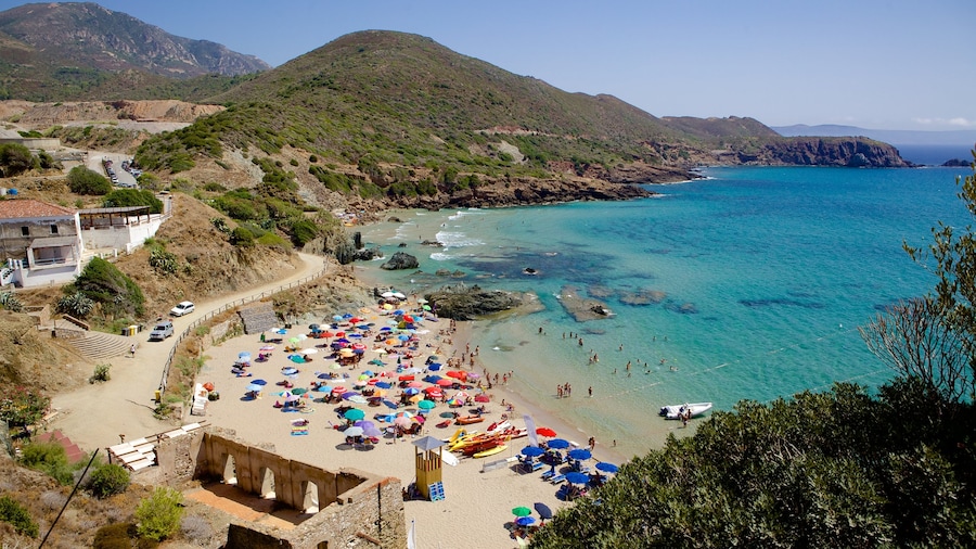 Porto Flavia featuring a sandy beach
