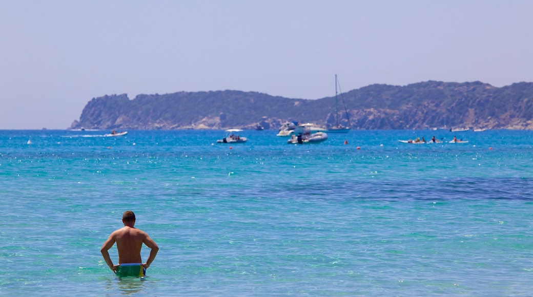 Simius Strand das einen Bootfahren, Felsküste und Schwimmen