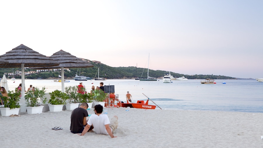 Golfo di Marinella showing general coastal views, a sunset and a sandy beach