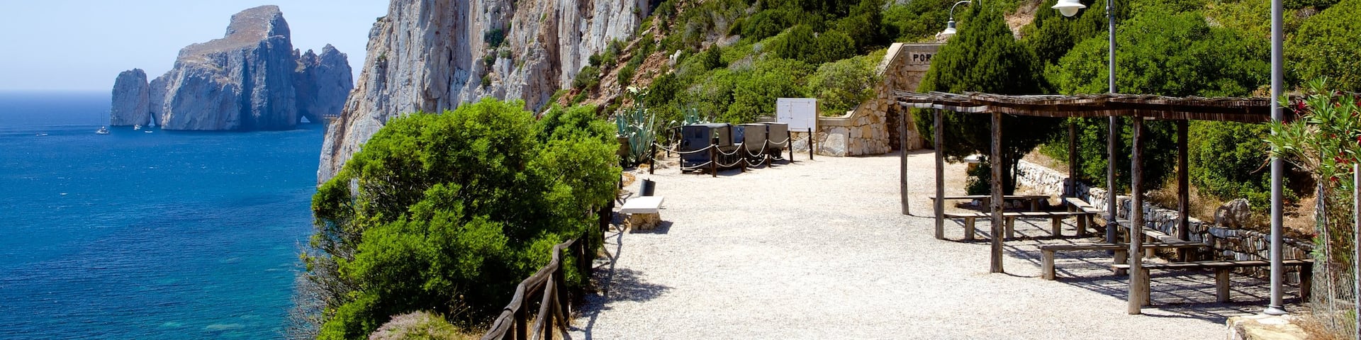 Porto Flavia showing rugged coastline