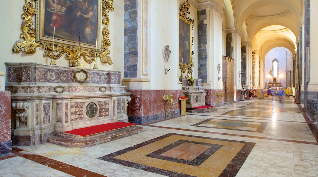 Catania Cathedral which includes heritage architecture, religious aspects and interior views