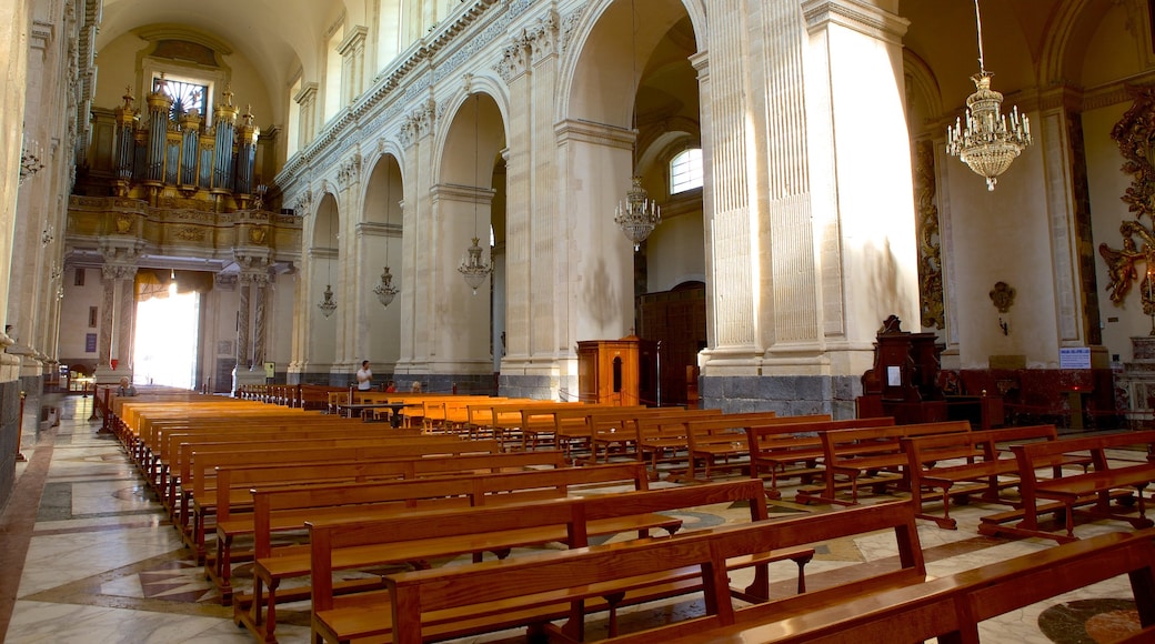 Catania Cathedral featuring religious elements, interior views and heritage architecture