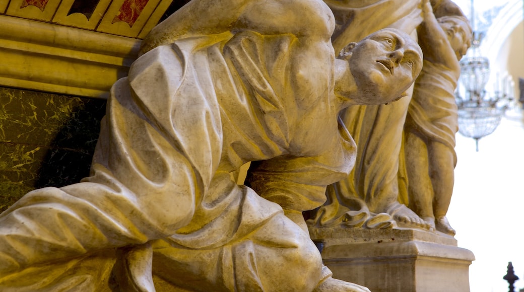 Catania Cathedral showing heritage architecture, a statue or sculpture and interior views