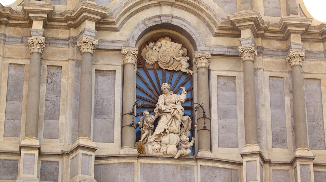 Catania Cathedral showing religious elements, a church or cathedral and a statue or sculpture