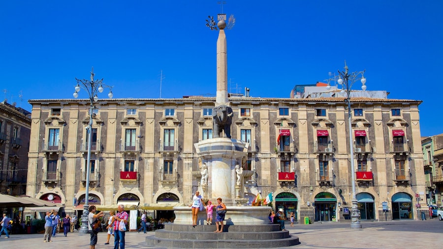 Cathedral Square which includes a statue or sculpture, a square or plaza and heritage architecture
