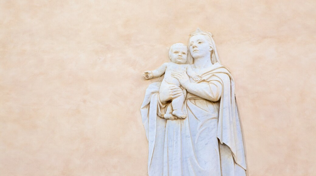 Sanctuary of Our Lady of Bonaria which includes a church or cathedral and religious elements