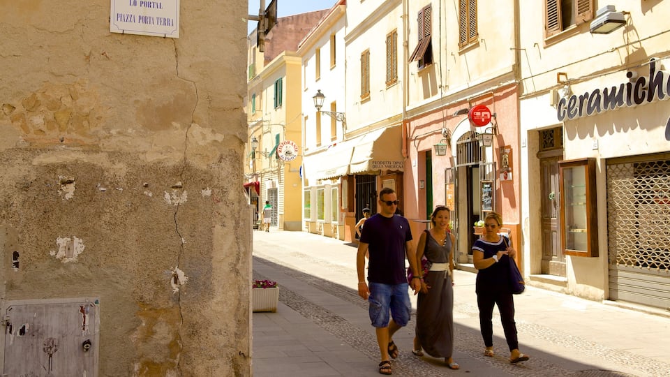 Alghero which includes heritage architecture, a small town or village and street scenes