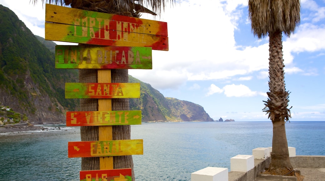 Madeira Island which includes signage and general coastal views