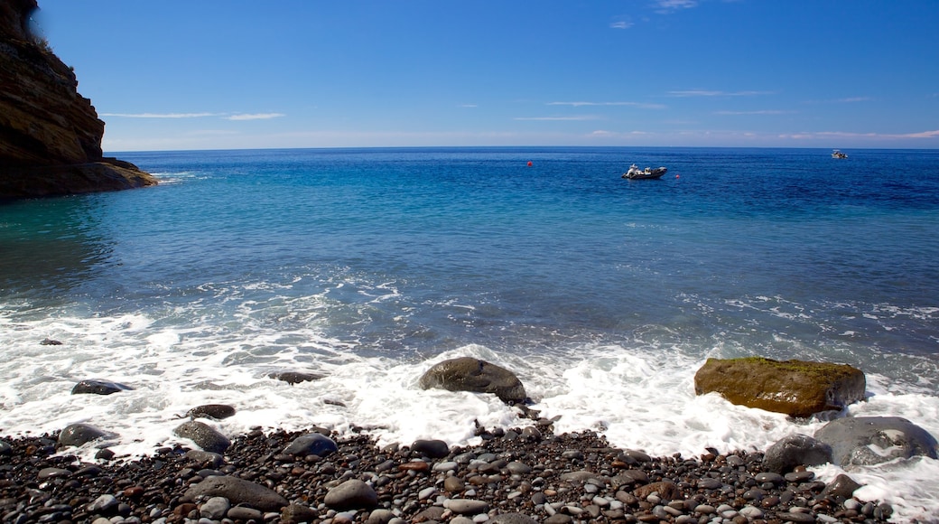 Reis Magos Beach which includes a pebble beach, landscape views and general coastal views