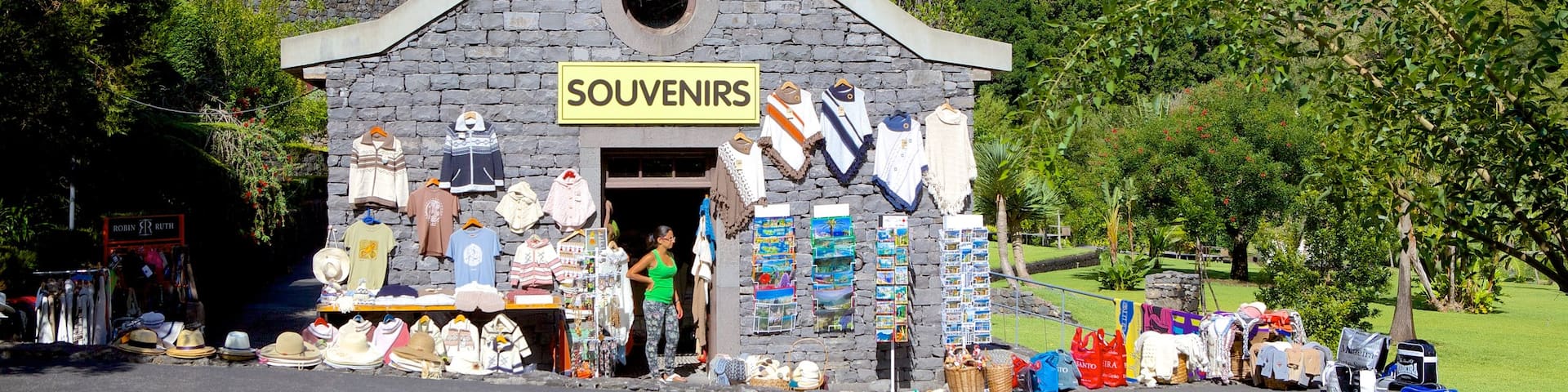 Caves of Sao Vicente and Volcanism Center featuring signage and shopping