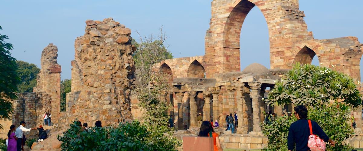 Qutub Minar featuring building ruins and heritage architecture