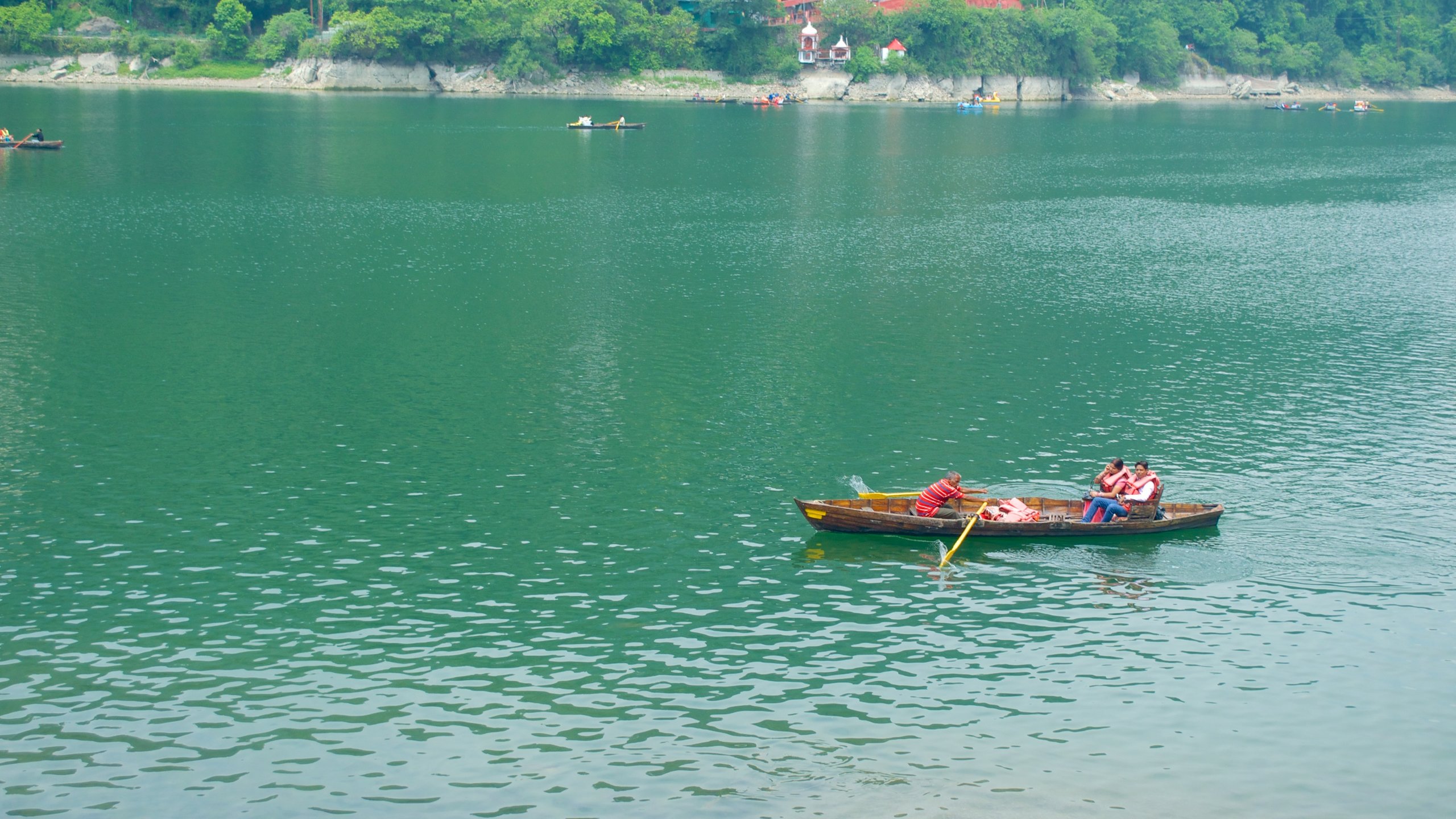 Nainital Lake featuring kayaking or canoeing and a lake or waterhole