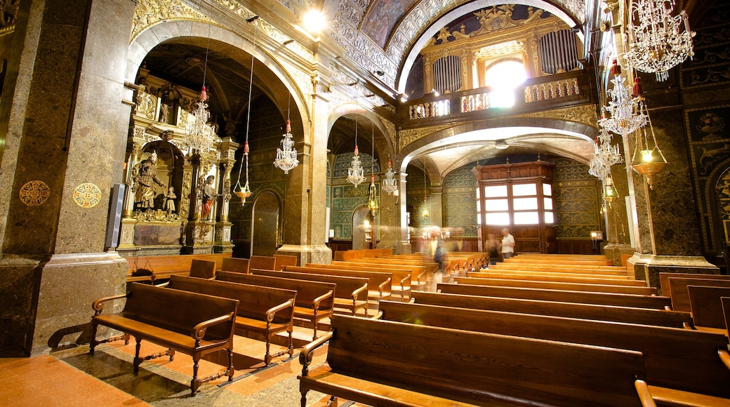 Lluc Monastery which includes religious elements, heritage architecture and interior views