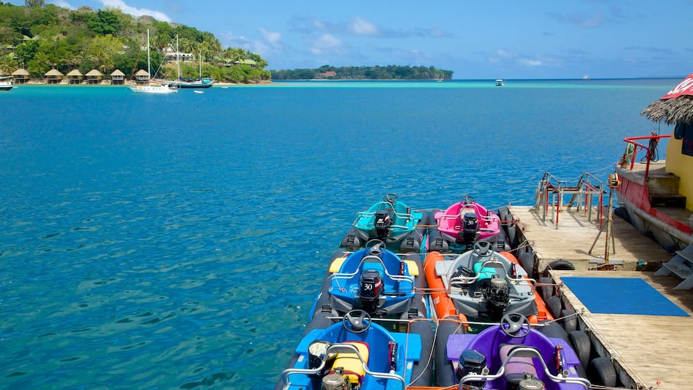 Port Vila which includes a coastal town, jet skiing and general coastal views