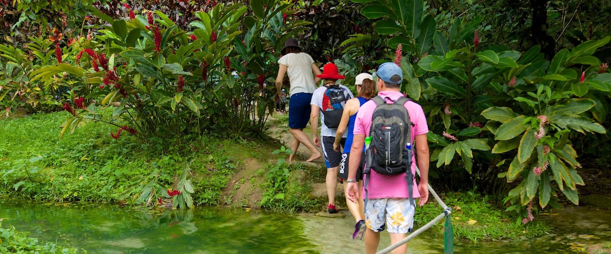 Efate showing hiking or walking as well as a small group of people